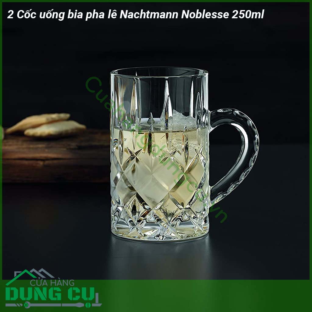 Cốc uống bia pha lê Nachtmann Noblesse 2 cốc 250ml chất liệu là pha lê không chì đảm bảo sức khoẻ tuổi thọ cực cao cầm nặng tay và sử dụng công nghệ chống vỡ xước và rạn nứt hiệu quả Dung tích cốc 250ml dùng để uống bia nước detox nước ngọt