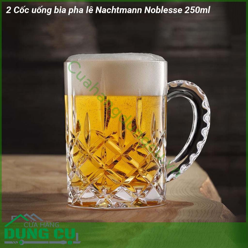 Cốc uống bia pha lê Nachtmann Noblesse 2 cốc 250ml chất liệu là pha lê không chì đảm bảo sức khoẻ tuổi thọ cực cao cầm nặng tay và sử dụng công nghệ chống vỡ xước và rạn nứt hiệu quả Dung tích cốc 250ml dùng để uống bia nước detox nước ngọt