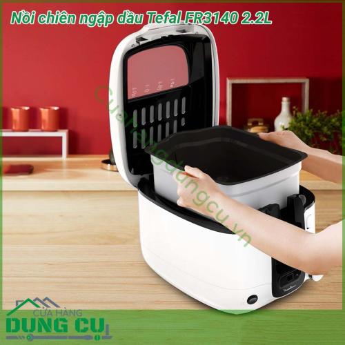 Nồi chiên ngập dầu Tefal FR3140 2 2 lit dung tích lớn dùng để chiên các món ngon cho tối đa 6 người Nồi dễ dàng vệ sinh hộp đựng và nắp có thể tháo rời và an toàn với máy rửa chén cũng như giỏ có tay cầm