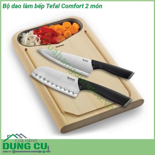 Bộ dao làm bếp Tefal Comfort 2 món được làm bằng thép không gỉ có tay cầm Ergonomic được thiết kế mềm mại giúp thoải mái khi cầm và dễ dàng thao tác Lưỡi dao bằng thép không gỉ chất lượng cao đem đến độ sắc bén và độ bền dài lâu đồng thời vỏ bọc lưỡi dao an toàn bảo vệ từng lưỡi dao giúp đảm bảo an toàn và dễ bảo quản khi không sử dụng