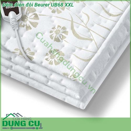 Đệm điện đôi Beurer UB68 XXL được hoạt động trên nguyên tắc cảm ứng thân nhiệt rất hiện đại trong đệm điện Beurer UB68XXL có gắn nhiệt kế cực nhỏ ở bề mặt trong đệm và một bộ điều khiển tích hợp đồng hồ hiển thị nhiệt độ Chế độ tự động ngắt sau khi hoạt động được khoảng 12 giờ có 4 nút tự động điều chỉnh nhiệt độ và tự động ngắt điện khi có sự cố đồng thời sản phẩm có thể giặt được bằng máy giặt hoặc bằng tay